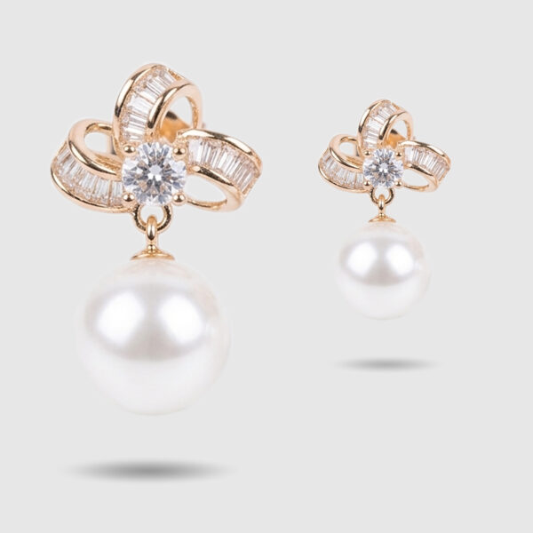 Gold Plated Bow Pearl Drop Earrings with Crystal Accent