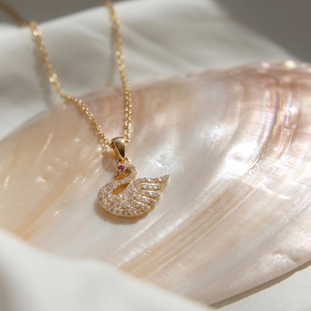 Elegant Gold-Tone Swan Pendant Necklace with Pavé Crystals & Ruby Eye